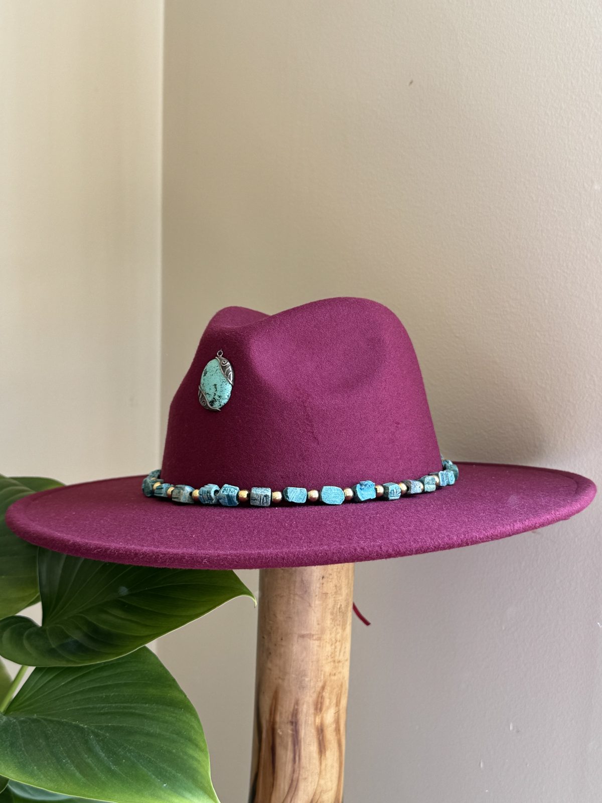 Grey fedora with diamond band and silver pin